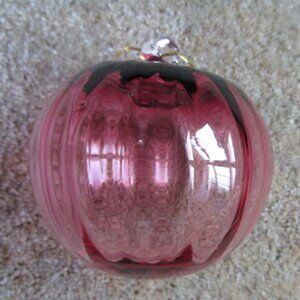 Hand blown cranberry glass ornament